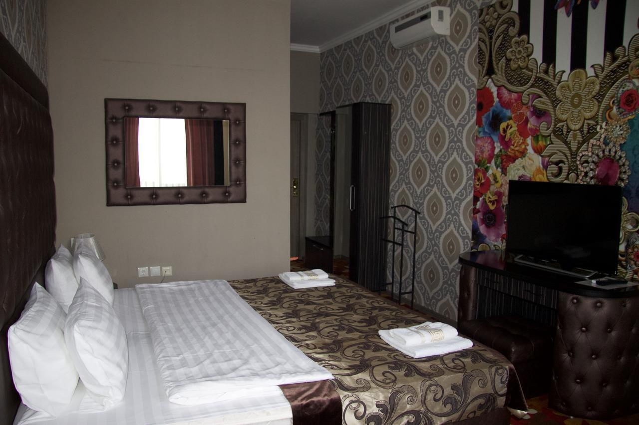 Deluxe Plaza Hotell Alma-Ata Exteriör bild